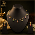 Ruby and emerald gold teardrop necklace set with matching earrings